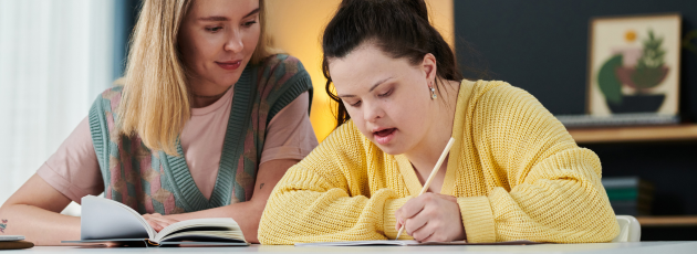 woman with disability filling out paperwork