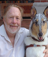 Photo of Marion Gwizdala and his guide dog Trooper