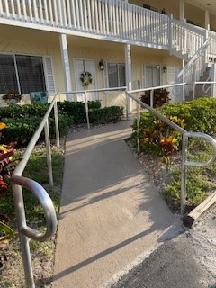 Updated walkway up to the yellow building. The walkway now has metal handrails on both sides and has a non-slip path.