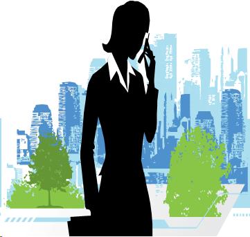 Image of a woman on a mobile phone walking along a city street.