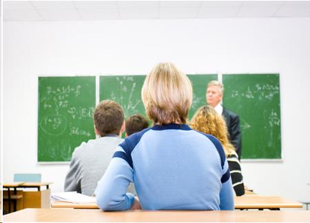 Photograph of older children in a classroon setting.